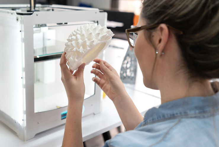 woman working with 3d printer