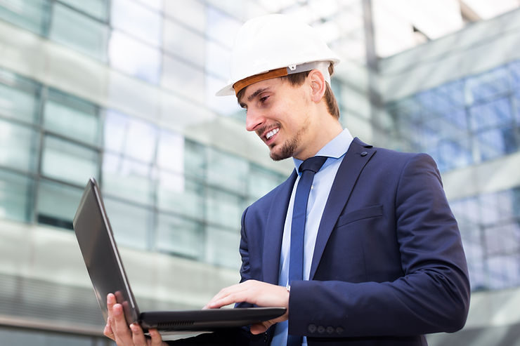 project manager using laptop outside